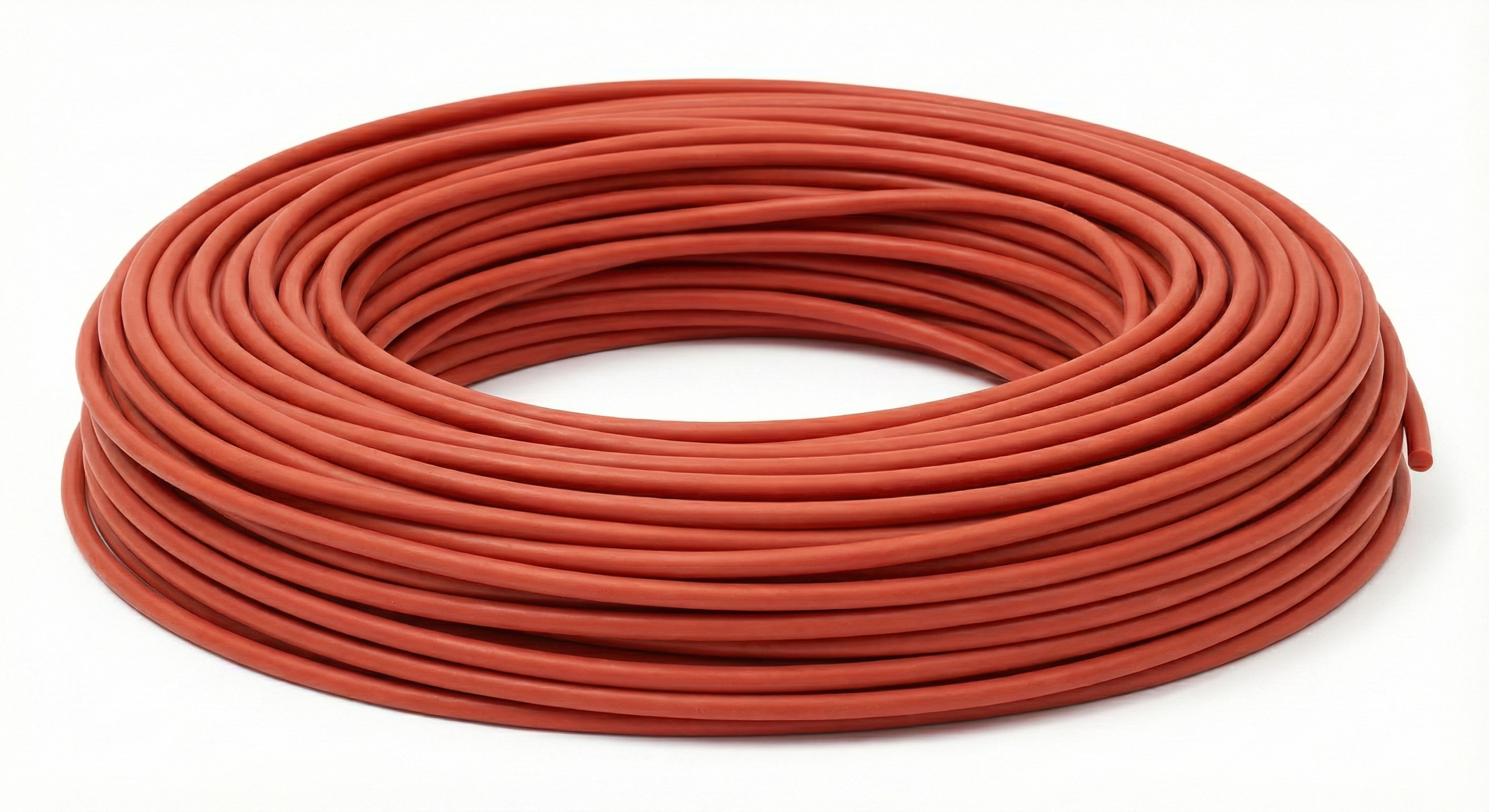 Czerwony sznur silikonowy VMQ zwinięty w krążek, przeznaczony do pracy w wysokich temperaturach.